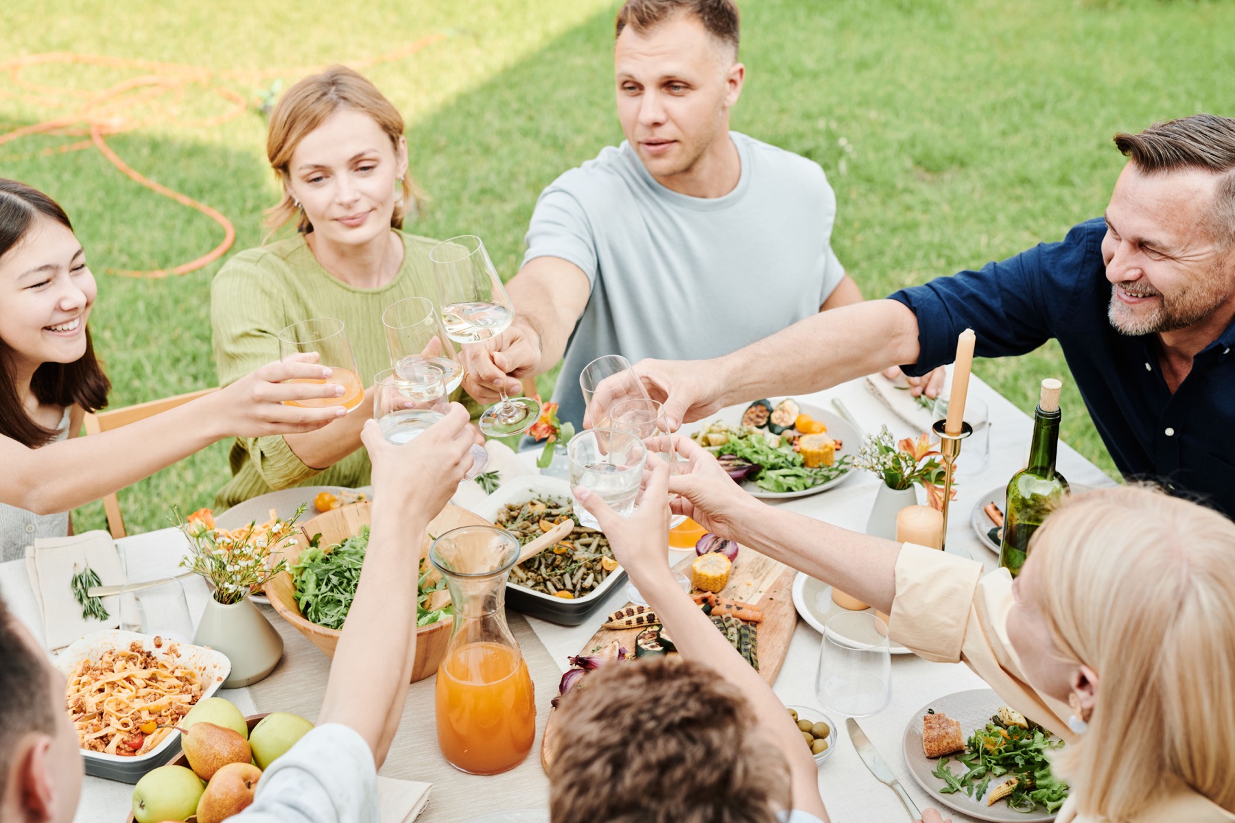 Team members sharing a meal outdoors