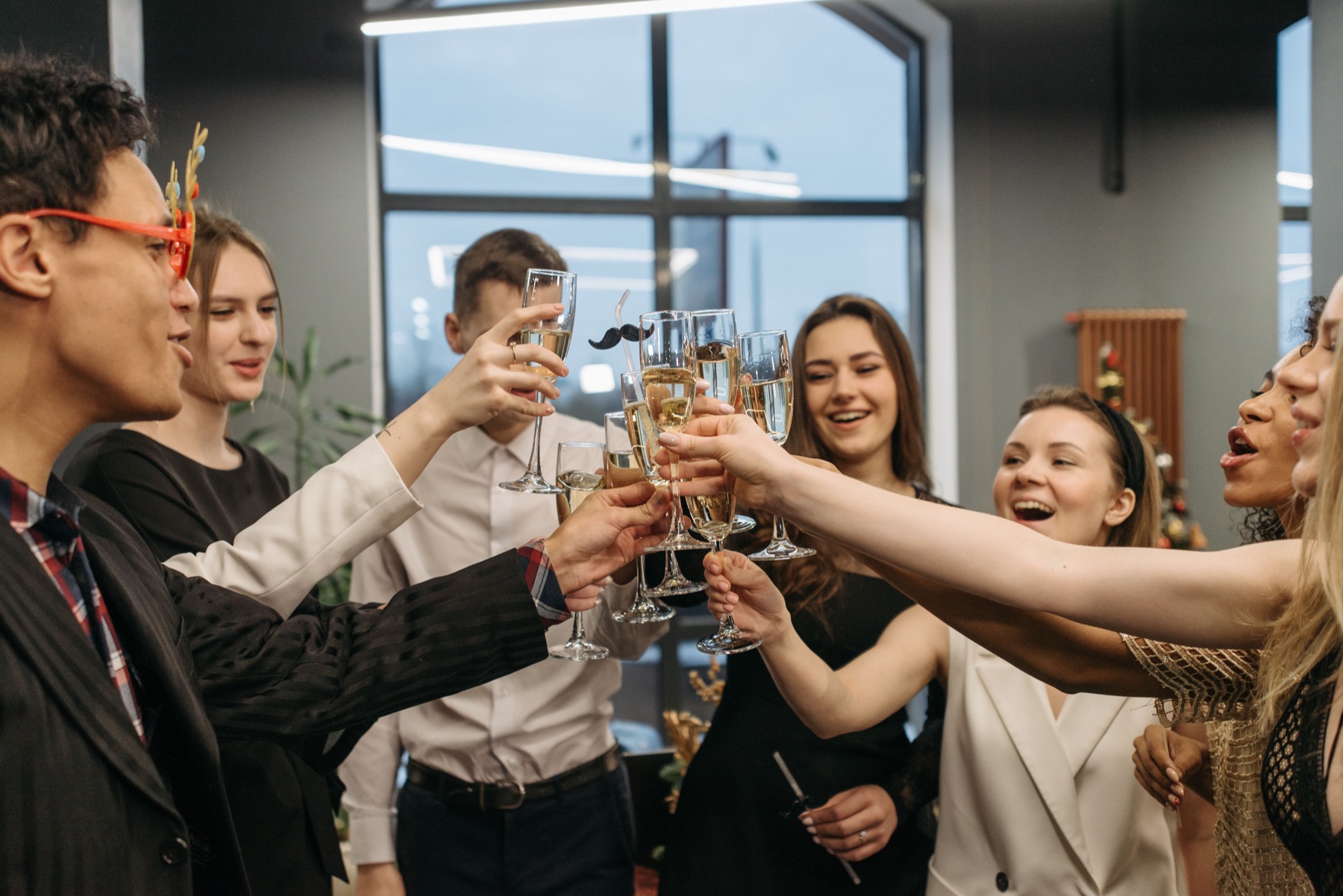 Colleagues celebrating together in the office